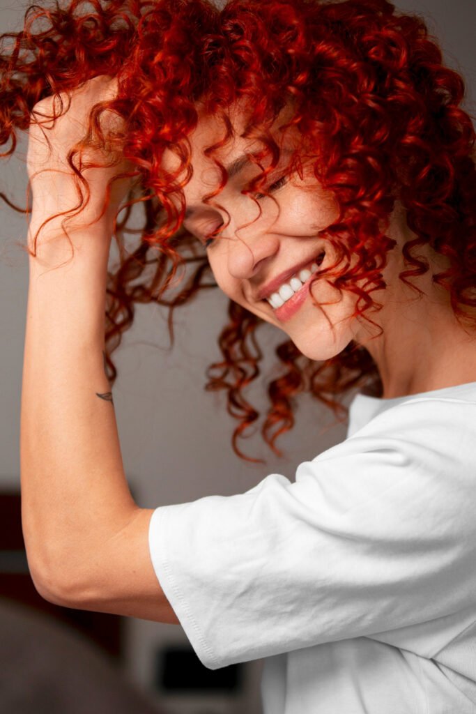 Brunette and Red Curly Hair Highlights