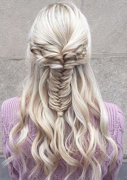 Pulled Fishtail Half up and half down curly hairstyle
